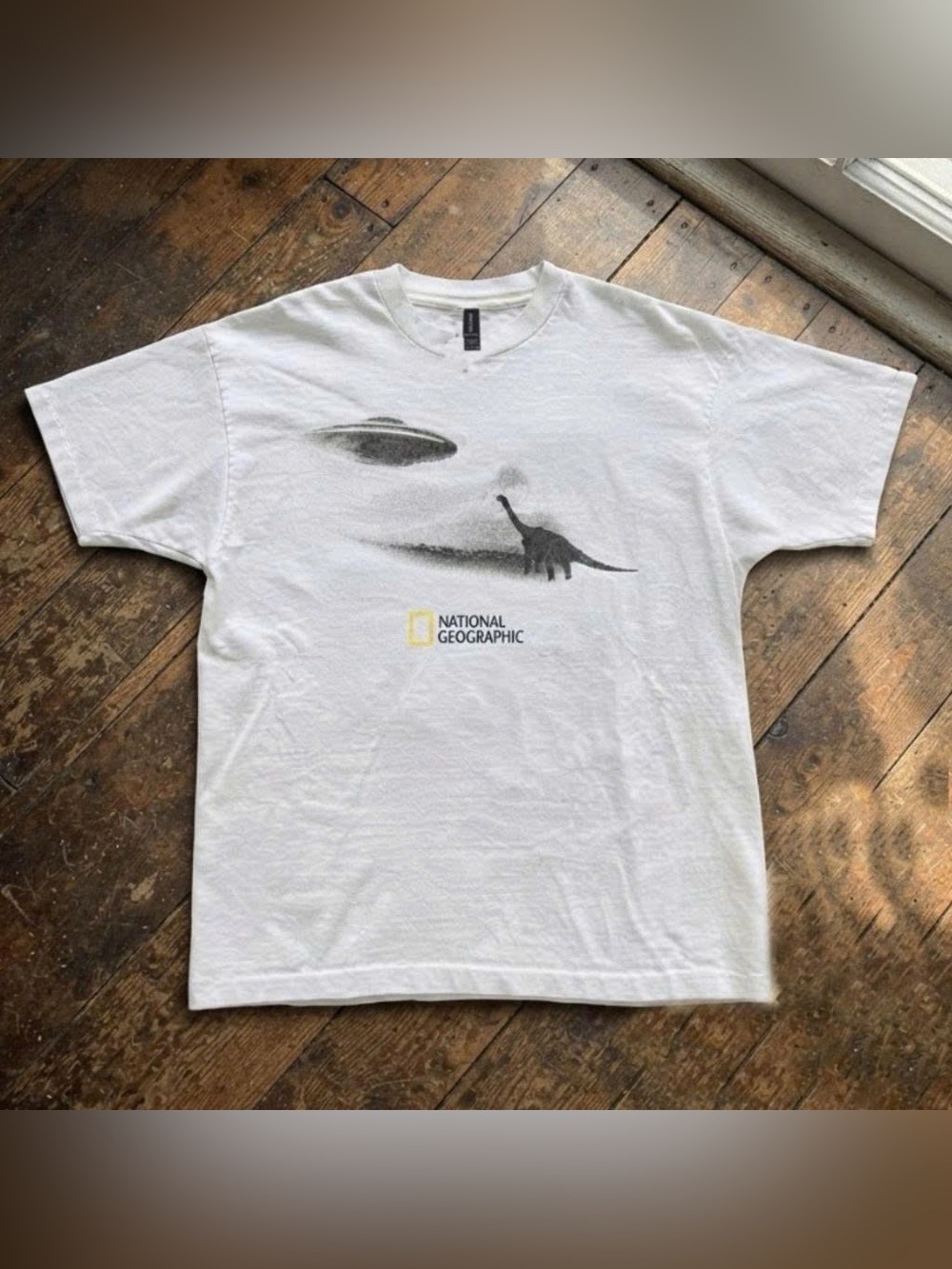 Vintage National Geographic White Tee with Dinosaur & UFO Sketch Graphic